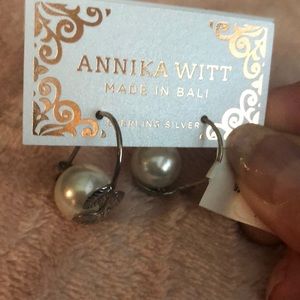 Sterling silver pierced earrings with large shell pearls